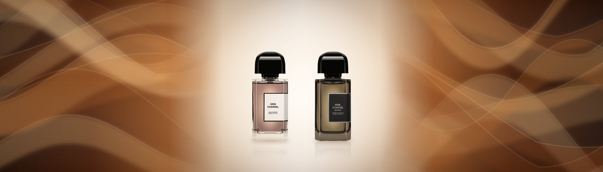 Gris Charnel Eau de Parfum und Gris Charnel Extrait von BDK Parfums vor bernsteinfarbenen Seidenschleiern
