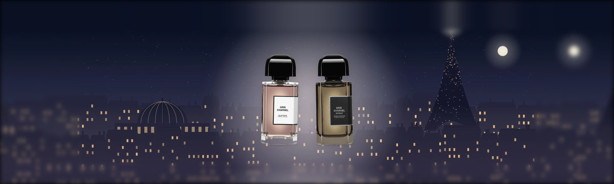 Gris Charnel und Gris Charnel Extrait von BDK Parfums vor der Pariser Skyline bei Nacht