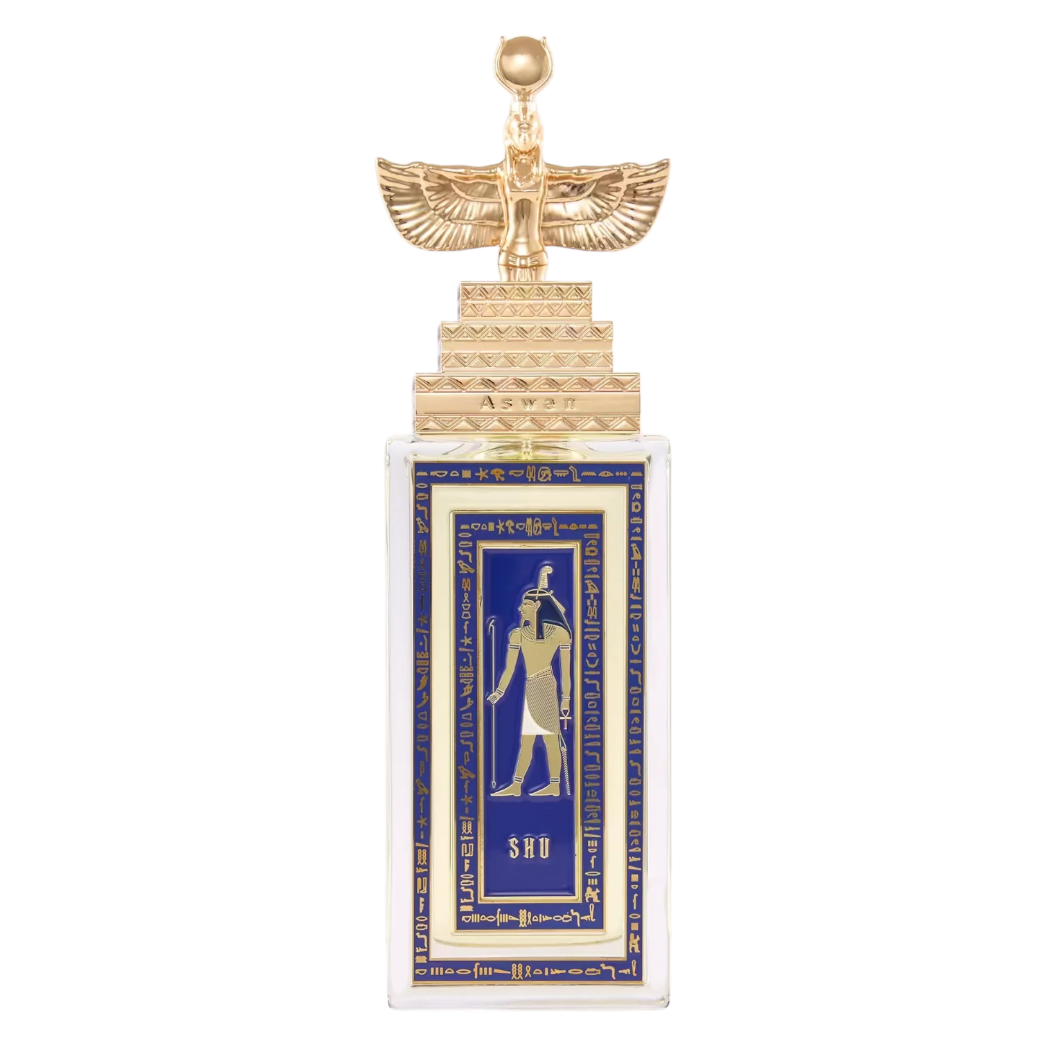Flakon von Aswan Shu – rechteckige klare Glasflasche mit goldener Verschlusskappe mit Pyramiden‑Prägung und ägyptischer Figur als 3D‑Element; Etikett in blau.