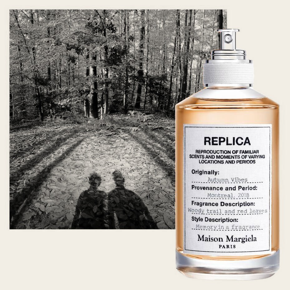 Replica Autumn Vibes by Maison Margiela – bottle in front of an autumn forest (mood shot)