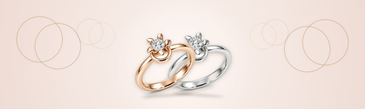 Noën Ringe Love 5 in Roségold und Weißgold mit Diamant