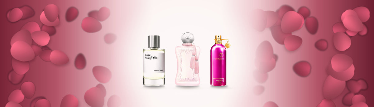 Rose Saltifolia von Maison Crivelli, Delina la Rosée von Parfums de Marly und Roses Musk von Montale zwischen Rosenblättern in Rosa und Bordeaux