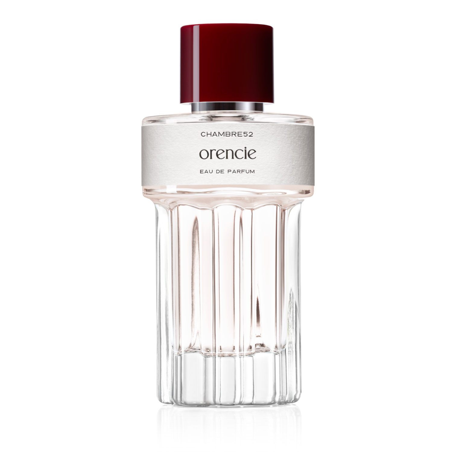 100ml Flakon von Orencie von Chambre52 – rundes Glasflakon mit bordeauxrotem Verschluss, cremeweißes Etikett, leuchtend klarer Duftinhalt.