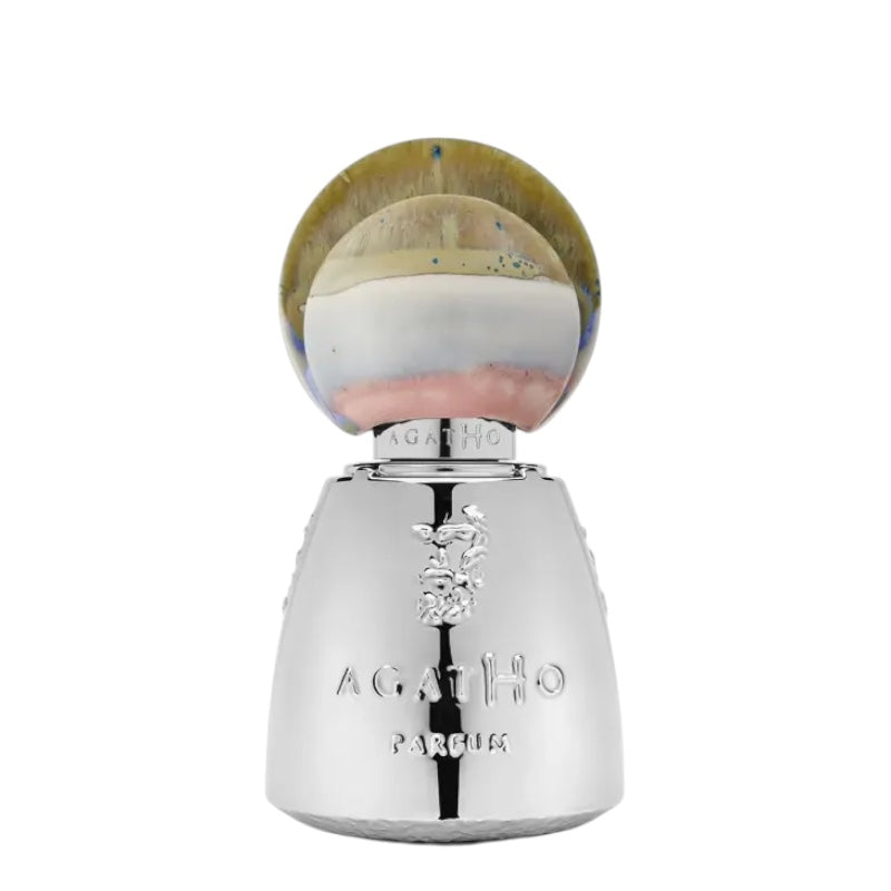 Agatho Portamarina Extrait de Parfum Flakon aus klarem Glas mit geometrischem Design und passendem Verschluss auf weißem Hintergrund.