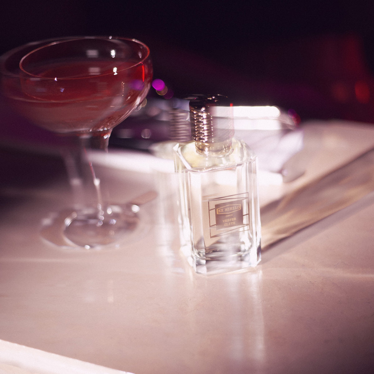 Vesper Glitz by Ex Nihilo – mood image with cocktail glass at night
